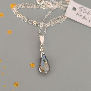 Elegant Sterling Silver and Iridescent Pendant Necklace